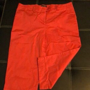 Red capris, dressy, cuff at bottom, stretchy material.